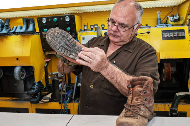 A Spanish shoemaker working in a workshop